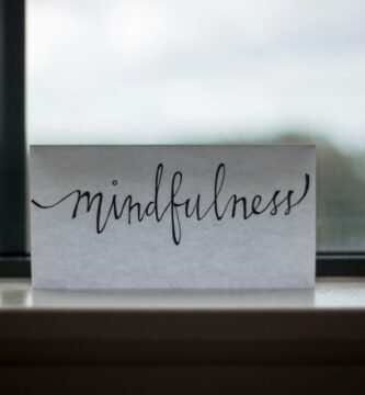 mindfulness printed paper near window