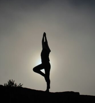 person doing yoga exercises